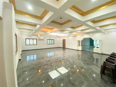 a large empty room with a dance floor at Coimbatore Premium Private Villa a FAMILY RESORT kids, celebration hall in Coimbatore