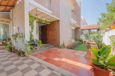 an image of a house with a courtyard at LikeMyVilla 3bedroom villa in Vānivilāsa Puram