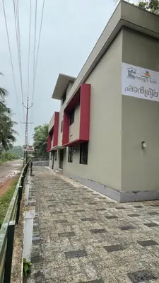 a building on the side of a road at Shangri-laa hotel apartments in Tāzhekkod
