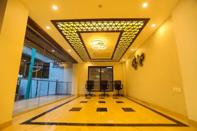 a room with a dance floor with chairs in it at The Zen Park Coimbatore in Coimbatore