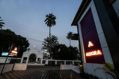 a mazon sign on the side of a building at Aldora Airport Residency in Nedumbassery