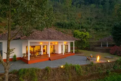 a villa with a view of a house at La Grove 2BHK with Stunning View - Kannur in Wayanad