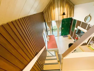 an overhead view of a staircase in a house at The Little Acres Cherai in Vypīn