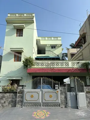 a building with a gate in front of it at Aishwarya Nivas in Palani