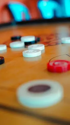 a close up of a wooden table with a group of buttons at kaffee valley - Kurumbalakotta in Padinjarathara